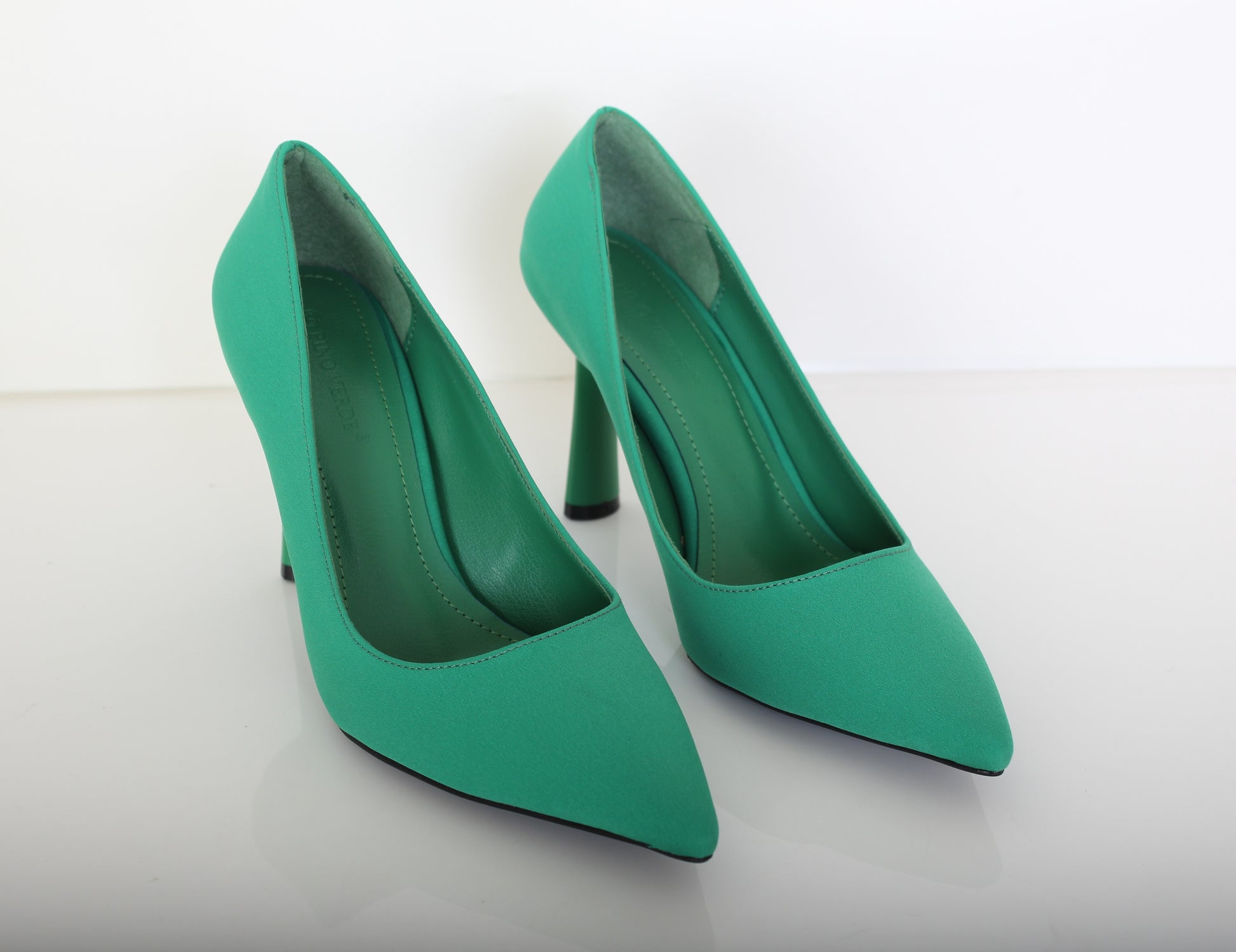 Green colored Heel pump shoes for women